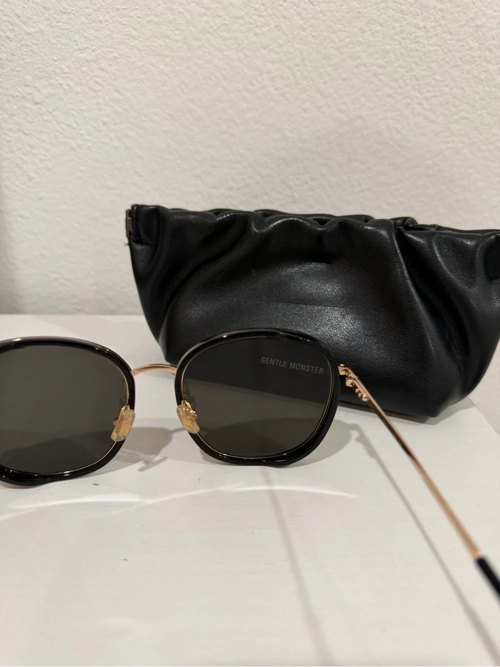 GENTLE MONSTER Black and Gold Round Sunglasses
